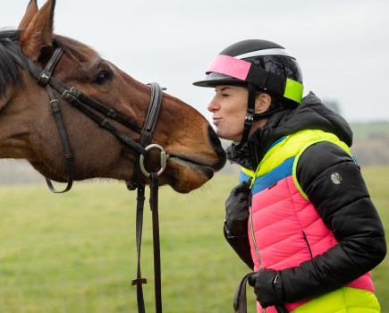 Charlotte Dujardin is pictured wearing an Equisafety high vis gilet and hat band