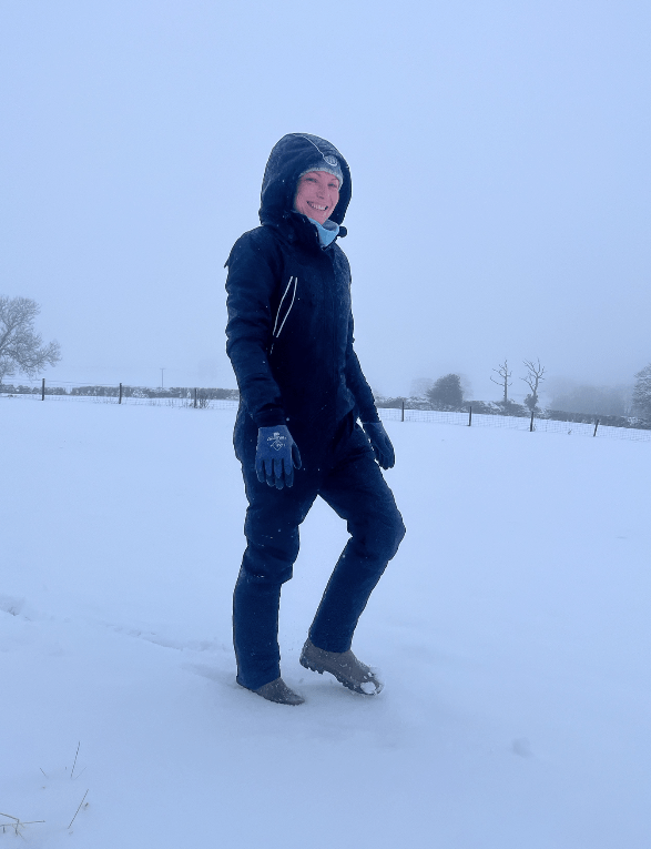 Our tester Stephanie keeps warm in the snow wearing a Catago Trainer Winter Jump Suit