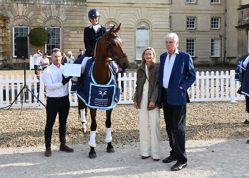 Pictured is the BE100 Voltaire Design Grassroots Champion at Badminton Lucinda Mills collecting her prize aboard Chaconda Blue