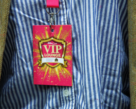 A close up of a VIP Your Horse Live ticket lanyard is shown