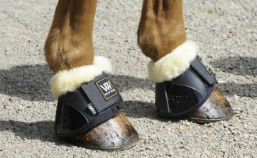 Pictured are Woof Wear Faux-sheepskin Overreach Boot